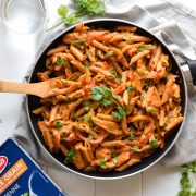 Filled with colorful bell peppers in a light yet creamy chili tomato sauce, this Healthy Chicken Fajita Pasta is perfect for those busy nights when you need to get something delicious yet healthy on the table quickly.