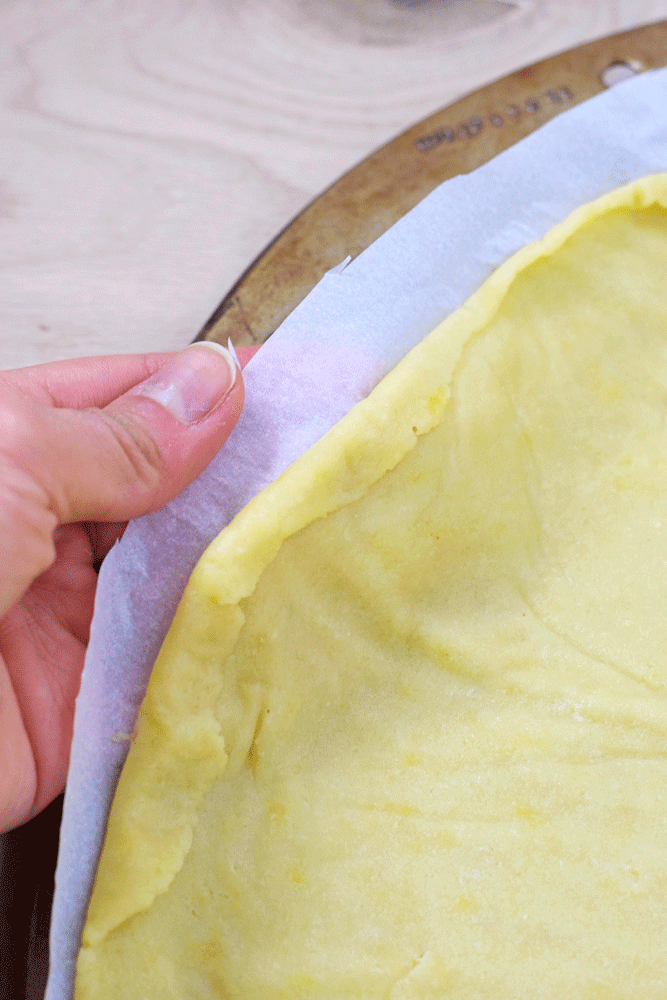 Gluten Free Pizza Crust - Made with almond and potato flour, this Gluten Free Pizza Crust is one of my favorites. It's a nice thin crust that isn't overly "rice-y" like many gluten free mixes. // isabeleats.com