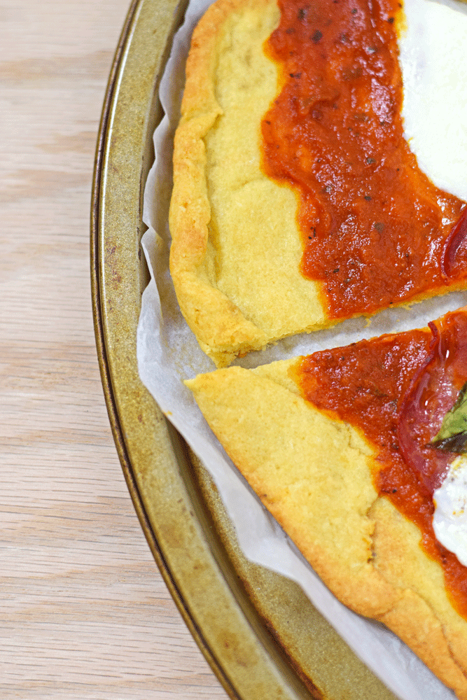 Gluten Free Pizza Crust - Made with almond and potato flour, this Gluten Free Pizza Crust is one of my favorites. It's a nice thin crust that isn't overly "rice-y" like many gluten free mixes. // isabeleats.com