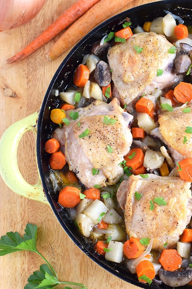 This Oven Roasted Chicken with Winter Vegetables recipe is the perfect one-skillet meal for those cold winter nights when all you want to do is snuggle up under a warm blanket on the couch. - isabeleats.com