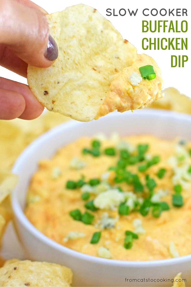 On the party menu is this dangerously good Slow Cooker Buffalo Chicken Dip recipe topped with bleu cheese crumbles and freshly chopped chives. I promise everyone will be asking you for the recipe by the end of the night! - isabeleats.com