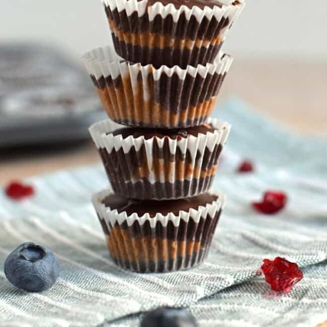 Chocolate Almond Butter Berry Cups topped with sea salt - no added sugar, no bake, dairy free, gluten free, paleo, raw, vegan, vegetarian | fromcatstocooking.com