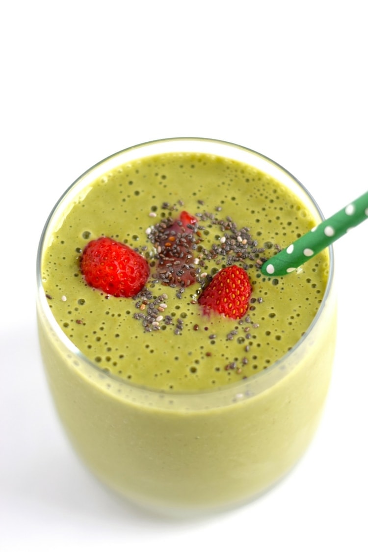 Strawberry Mango Green Smoothie - An easy, quick and tasty on-the-go breakfast smoothie or post-workout drink filled with fruit, greens and greek yogurt. Can easily be dairy free! - isabeleats.com