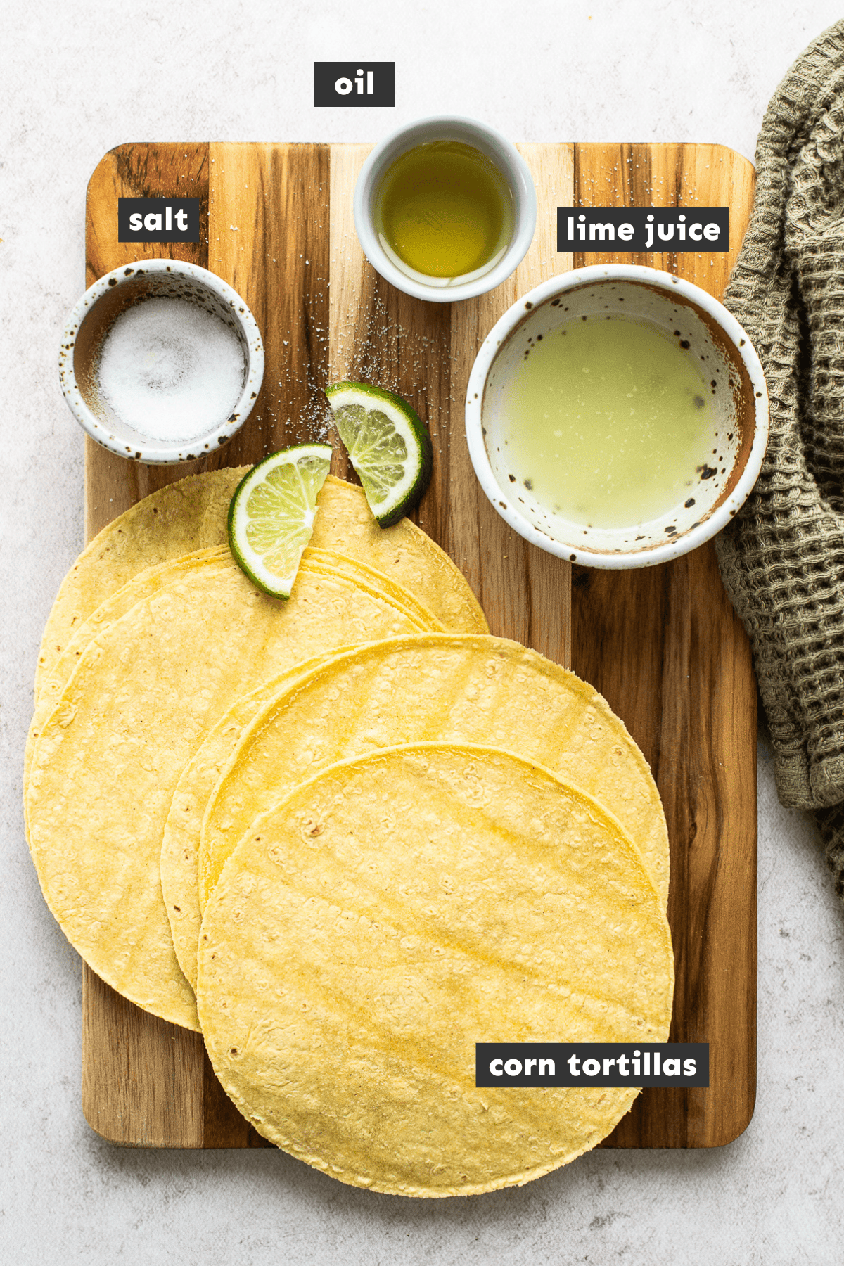 Baked tortilla chips ingredients on a table.