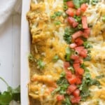 These Weeknight Enchiladas Verdes are made with chicken and covered in an easy salsa verde. Baked to perfection, they make a great dinner and tasty leftovers that everyone will be excited to eat!