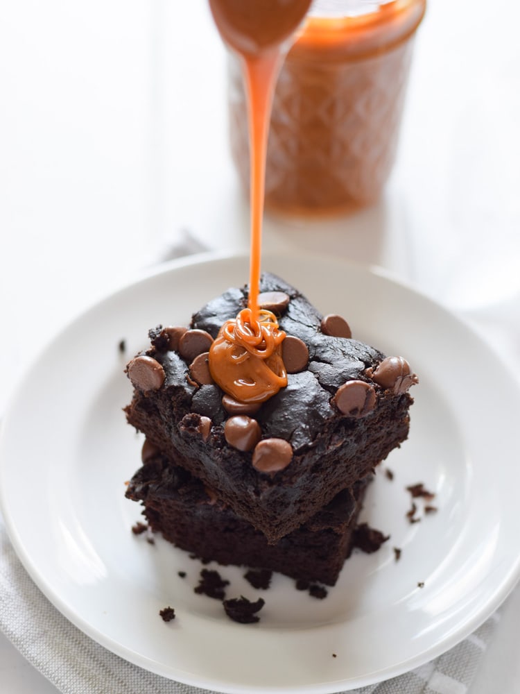This Easy Cajeta (Mexican Caramel) recipe is made with only 5 ingredients and is easy to make. It's the perfect topping for your favorite dessert and can even be enjoyed all on it's own. If you like dulce de leche, you're going to love cajeta!