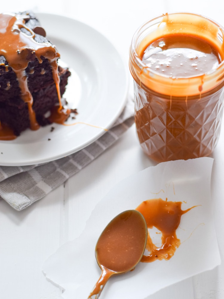 This Easy Cajeta (Mexican Caramel) recipe is made with only 5 ingredients and is easy to make. It's the perfect topping for your favorite dessert and can even be enjoyed all on it's own. If you like dulce de leche, you're going to love cajeta!