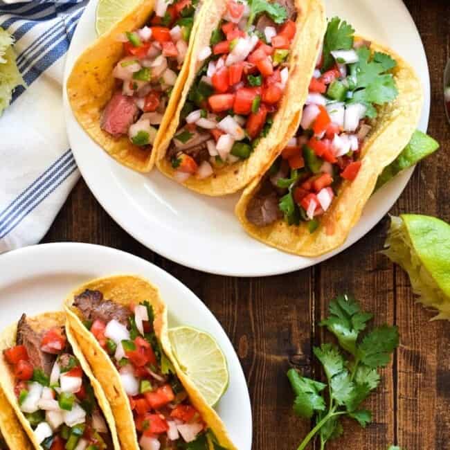 Topped with fresh pico de gallo salsa for an added crunch, these easy-to-make Marinated Flank Steak Cacos are juicy, bright and super flavorful. Perfect for any weeknight meal! (gluten free, dairy free, paleo)