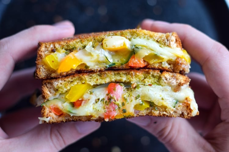 Made with sautéed vegetables, a cilantro parsley chimichurri spread and lots of melted cheese, this Mexican Fajita Grilled Cheese will leave you full and oh so happy. (vegetarian)