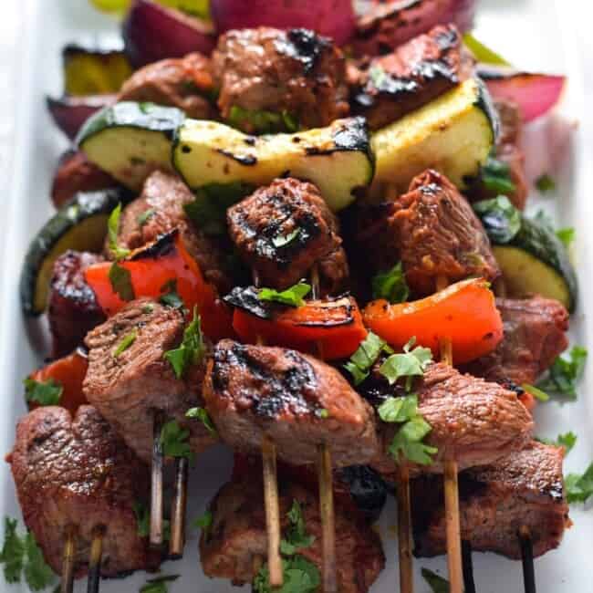 Made with marinated sirloin steak and delicious vegetables, these Easy Beef Skewers are the perfect low carb appetizer or healthy dinner!