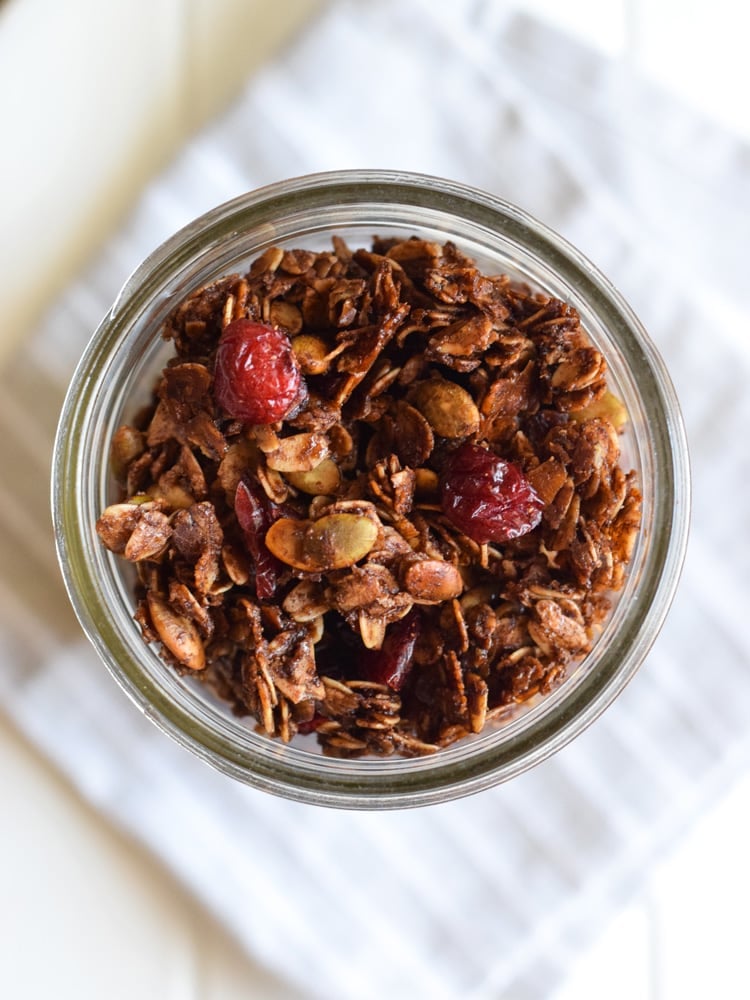 Made with wholesome rolled oats, Abuelita Mexican chocolate, pumpkin seeds and dried cranberries, this Mexican Chocolate Pumpkin Seed Granola is a delicious breakfast or snack any time of the day! (gluten free, vegetarian)