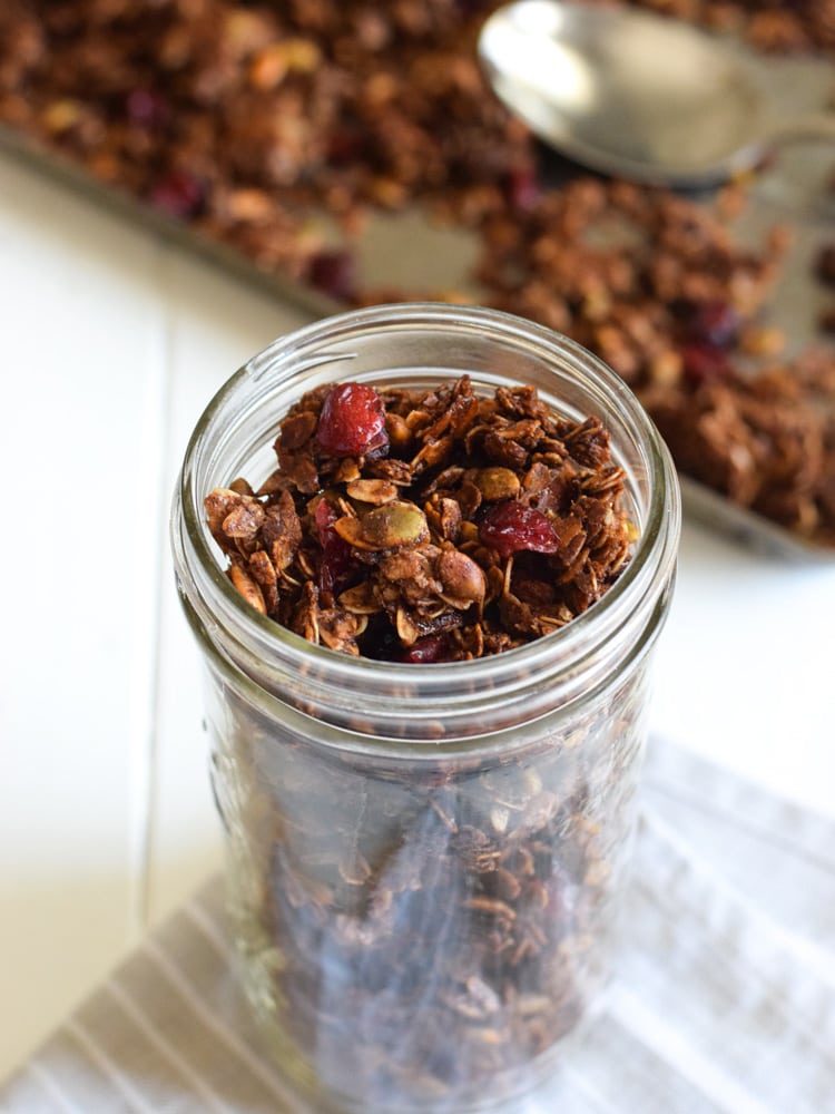 Made with wholesome rolled oats, Abuelita Mexican chocolate, pumpkin seeds and dried cranberries, this Mexican Chocolate Pumpkin Seed Granola is a delicious breakfast or snack any time of the day! (gluten free, vegetarian)