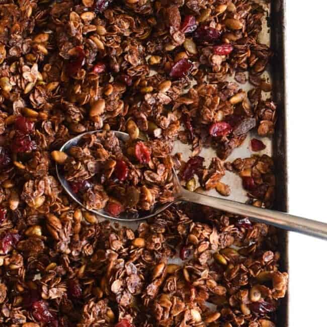 Made with only wholesome rolled oats, Abuelita Mexican chocolate, pumpkin seeds and dried cranberries, this Mexican Chocolate Pumpkin Seed Granola is a delicious breakfast or snack any time of the day! (gluten free, vegetarian)