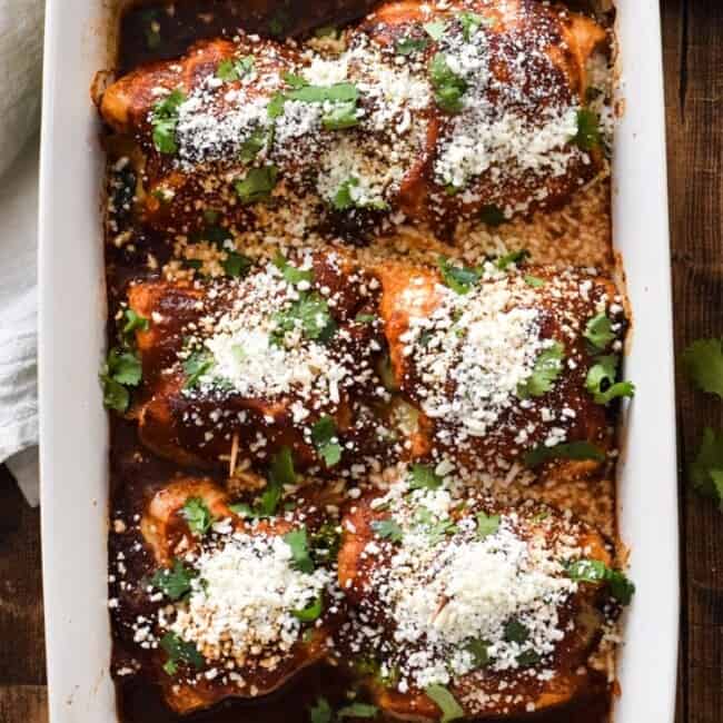 Make your life a little tastier with these cheesy Chicken Enchilada Roll Ups covered in an authentic red enchilada sauce. Plus, they're low carb and gluten free!