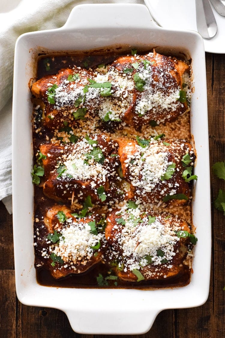 Make your life a little tastier with these cheesy Chicken Enchilada Roll Ups covered in an authentic red enchilada sauce. Plus, they're low carb and gluten free!