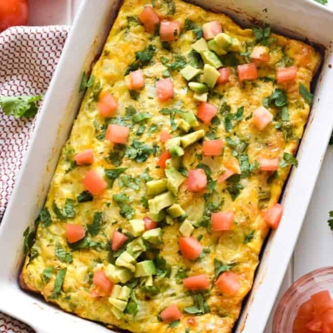 This Salsa Verde Breakfast Frittata is what breakfast dreams are made of. Topped with a salsa verde yogurt sauce, this vegetarian dish is perfect for brunch on those lazy weekends. Is gluten free, vegetarian, paleo and low carb.