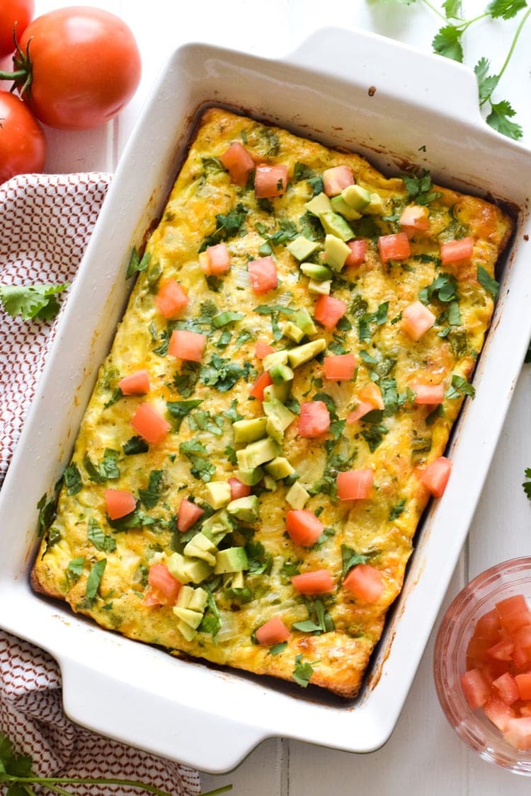 This Salsa Verde Breakfast Frittata is what breakfast dreams are made of. Topped with a salsa verde yogurt sauce, this vegetarian dish is perfect for brunch on those lazy weekends. Is gluten free, vegetarian, paleo and low carb.