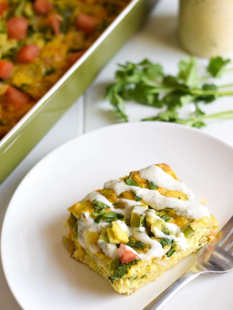 This Salsa Verde Breakfast Frittata is what breakfast dreams are made of. Topped with a salsa verde yogurt sauce, this vegetarian dish is perfect for brunch on those lazy weekends. Is gluten free, vegetarian, paleo and low carb.