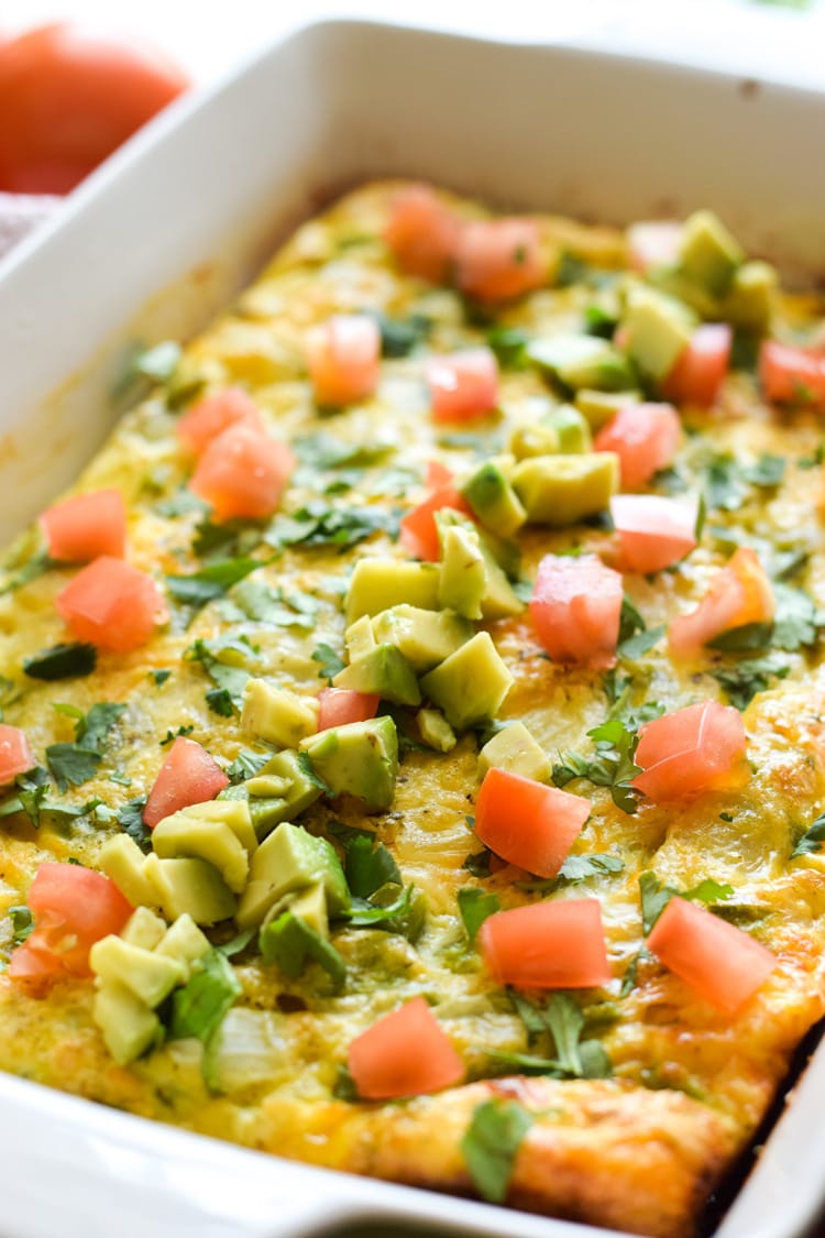 This Salsa Verde Breakfast Frittata is what breakfast dreams are made of. Topped with a salsa verde yogurt sauce, this vegetarian dish is perfect for brunch on those lazy weekends. Is gluten free, vegetarian, paleo and low carb.
