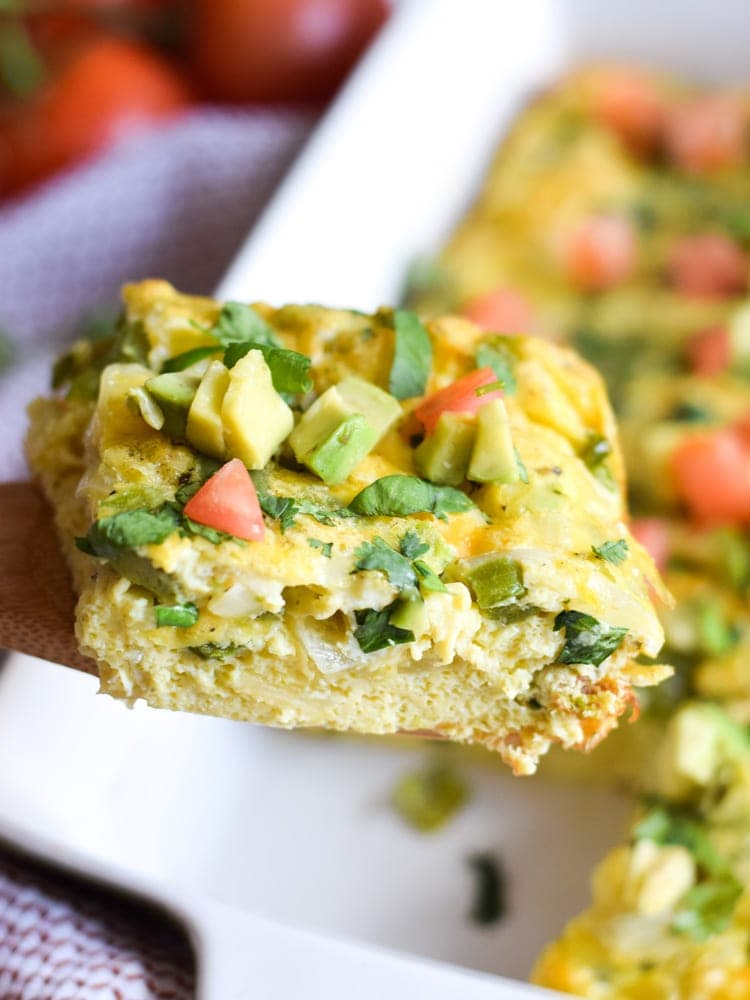 This Salsa Verde Breakfast Frittata is what breakfast dreams are made of. Topped with a salsa verde yogurt sauce, this vegetarian dish is perfect for brunch on those lazy weekends. Is gluten free, vegetarian, paleo and low carb.