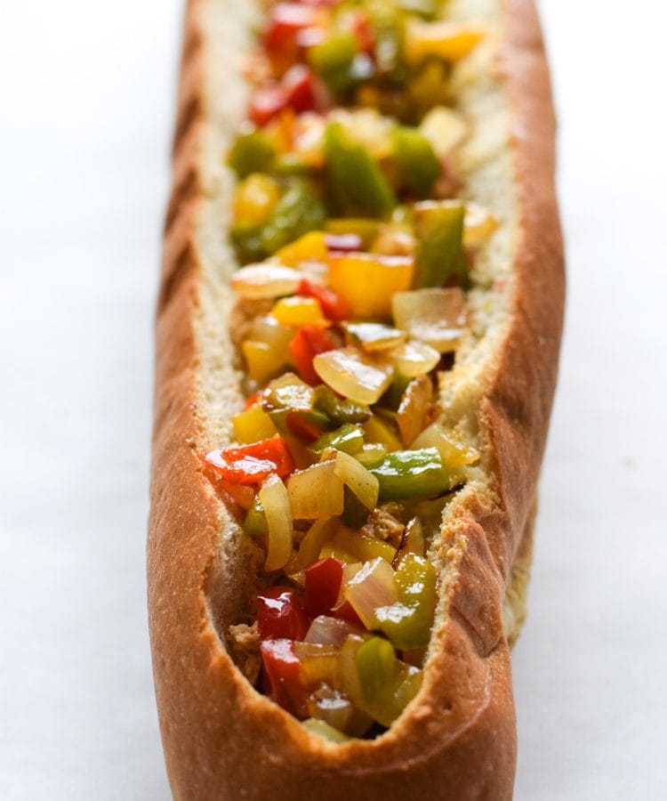 A crowd favorite, this Chicken Fajita Stuffed French Bread is a creamy, cheesy, and super flavorful appetizer that's perfect for parties and game day!