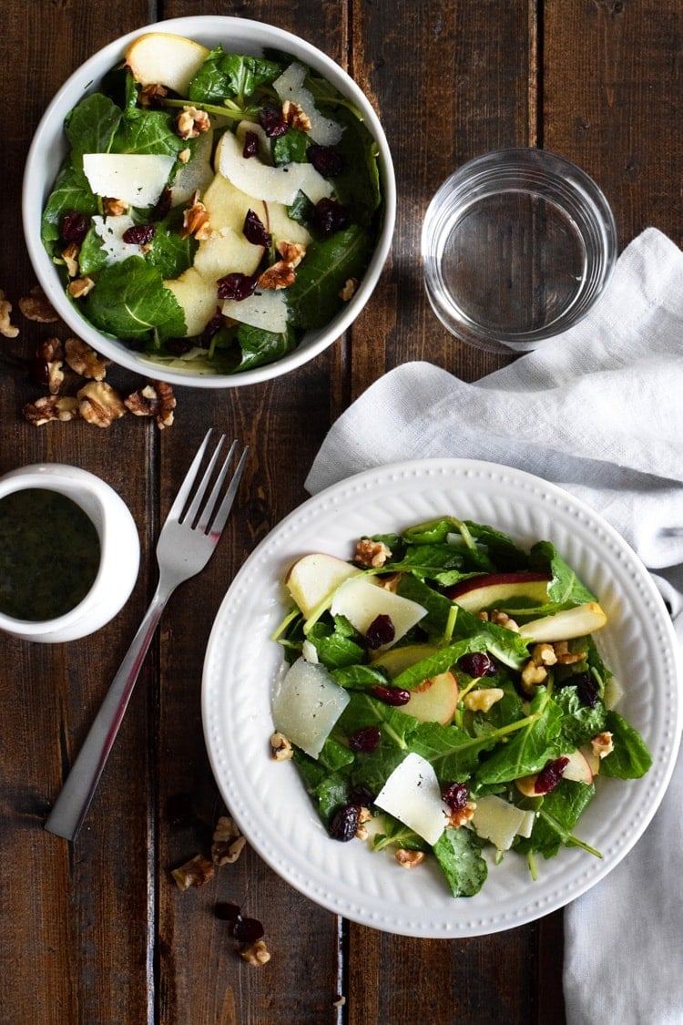 This Apple Pear Salad with a Honey Cilantro Vinaigrette is an easy 5 minute recipe made with crunchy apples, sliced pears, dried cranberries, walnuts and shaved Manchego cheese. (gluten free, low carb, paleo, vegetarian)