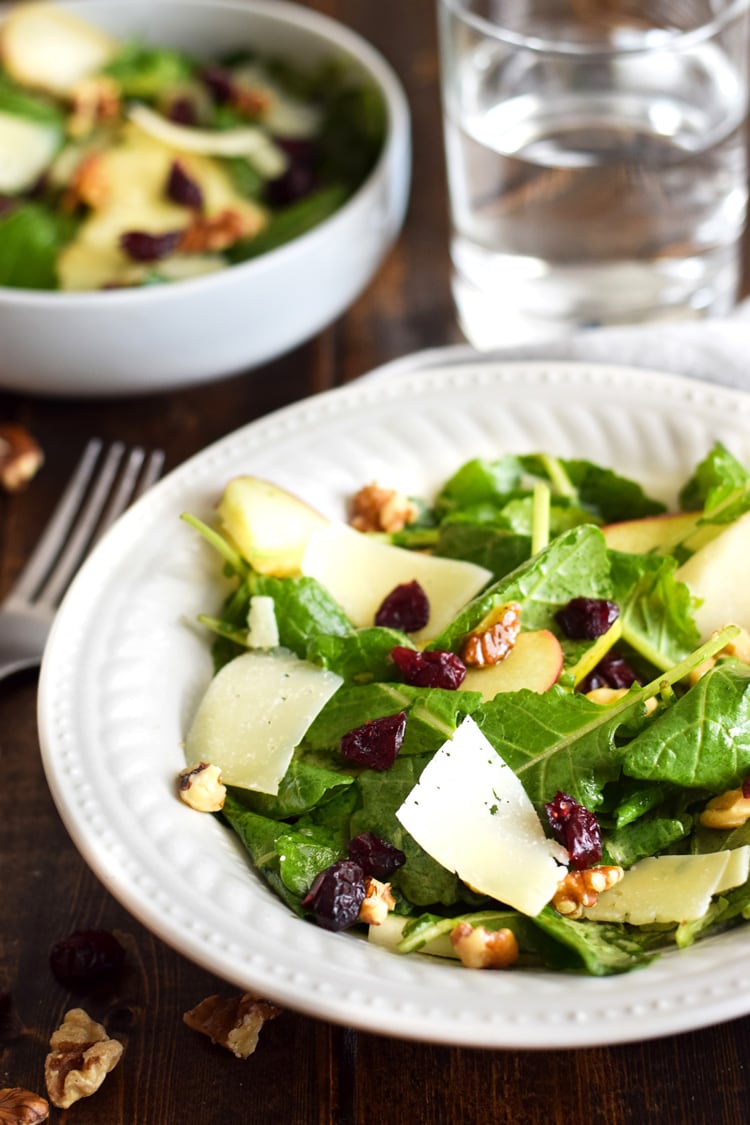 This Apple Pear Salad with a Honey Cilantro Vinaigrette is an easy 5 minute recipe made with crunchy apples, sliced pears, dried cranberries, walnuts and shaved Manchego cheese. (gluten free, low carb, paleo, vegetarian)