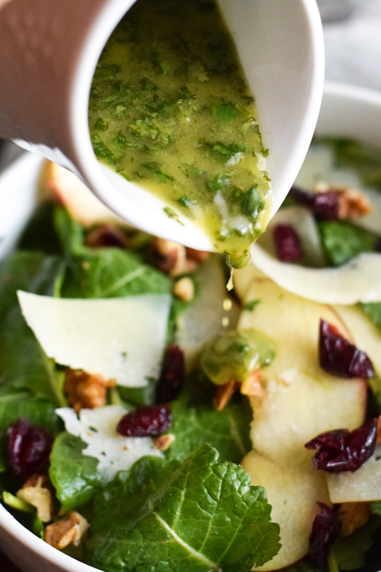 This Apple Pear Salad with a Honey Cilantro Vinaigrette is an easy 5 minute recipe made with crunchy apples, sliced pears, dried cranberries, walnuts and shaved Manchego cheese. (gluten free, low carb, paleo, vegetarian)