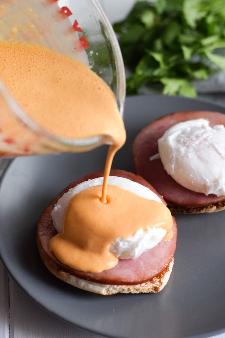 Easy Chipotle Eggs Benedict recipe made with a lightened-up blender chipotle hollandaise sauce. Ready in only 25 minutes and is the perfect brunch!