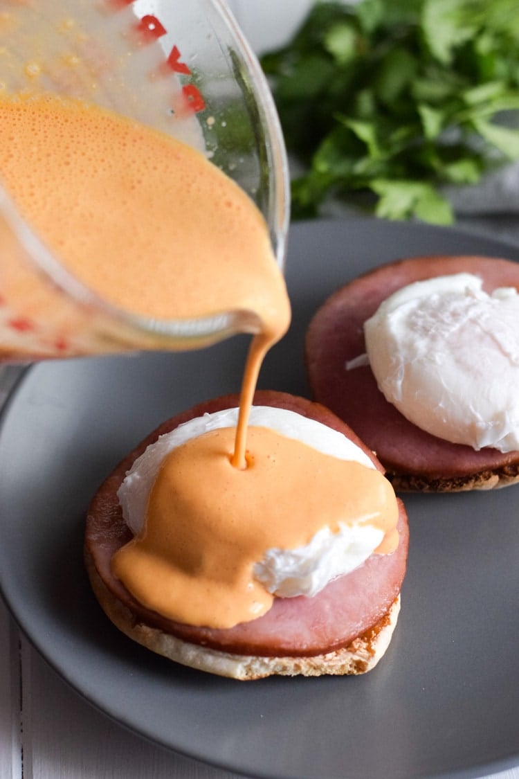 Easy Chipotle Eggs Benedict recipe made with a lightened-up blender chipotle hollandaise sauce. Ready in only 25 minutes and is the perfect brunch!