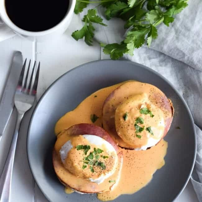 Easy Chipotle Eggs Benedict recipe made with a lightened-up blender chipotle hollandaise sauce. Ready in only 25 minutes and is the perfect brunch!