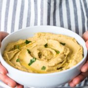 This Easy Lime Avocado Hummus made with avocados and chickpeas is the perfect healthy snack for any time of the day! Requires no tahini and is gluten free, vegetarian, and vegan!