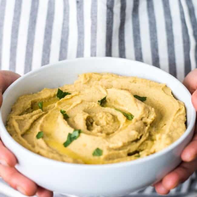 This Easy Lime Avocado Hummus made with avocados and chickpeas is the perfect healthy snack for any time of the day! Requires no tahini and is gluten free, vegetarian, and vegan!