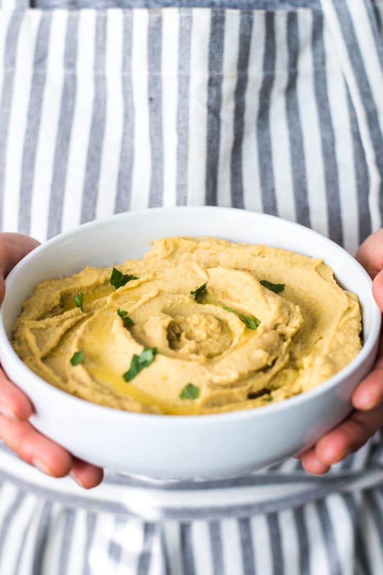 This Easy Lime Avocado Hummus made with avocados and chickpeas is the perfect healthy snack for any time of the day! Requires no tahini and is gluten free, vegetarian, and vegan!
