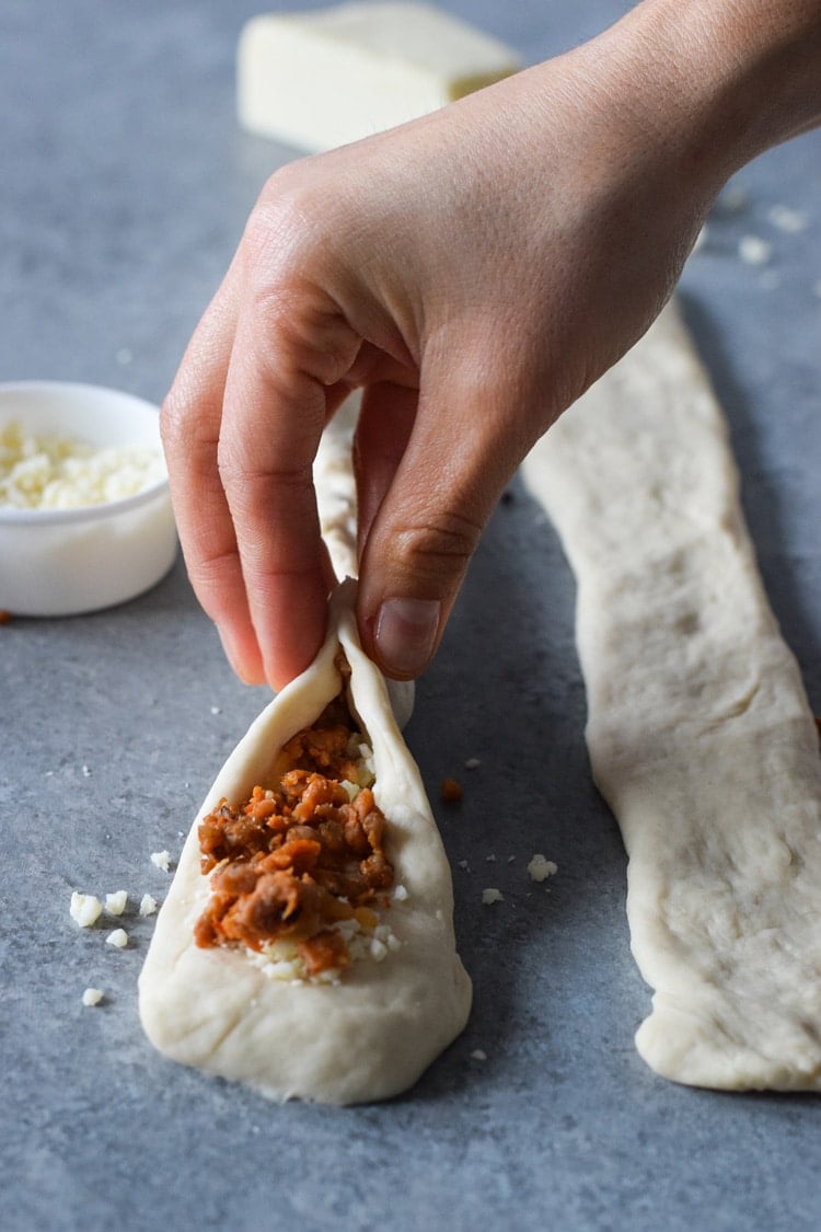 These Mexican Chorizo Cotija Stuffed Pretzel Bites are the ultimate irresistible appetizer and salty snack for your next party and get-together.