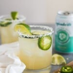 A Cucumber Jalapeno Margarita made with refreshing cucumber sparkling water, fresh jalapeños and organic agave nectar because it's 5 o'clock somewhere!