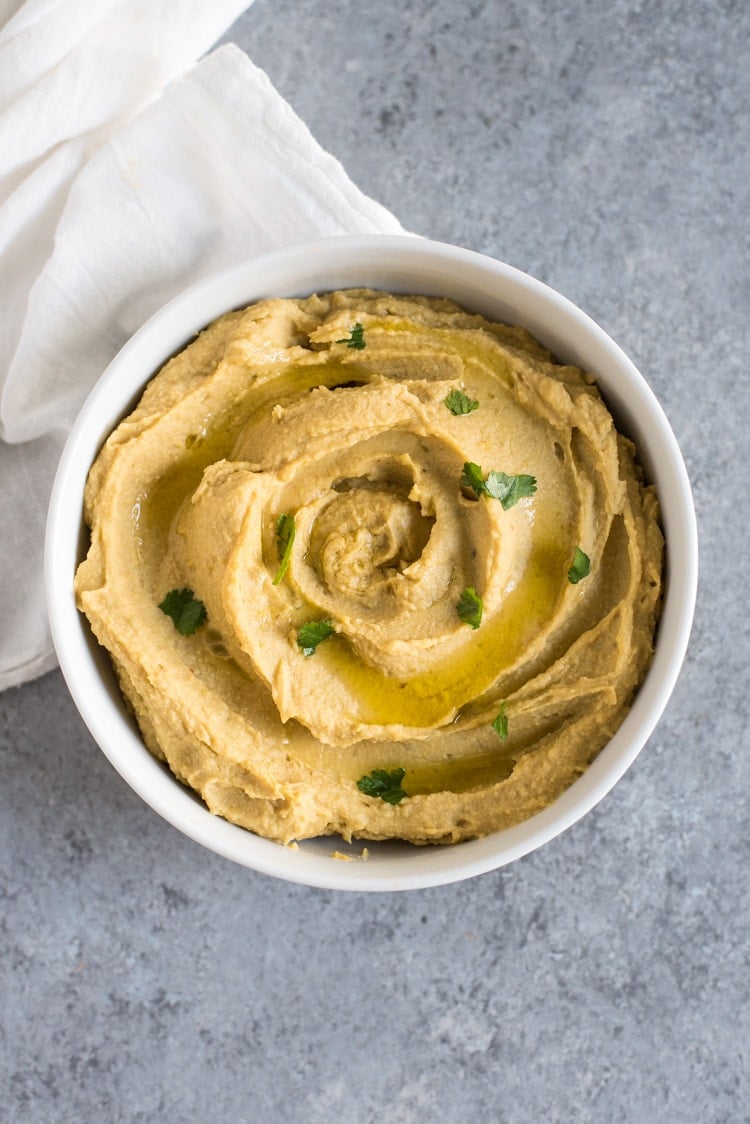 This Easy Lime Avocado Hummus made with avocados and chickpeas is the perfect healthy snack that requires no tahini! (gluten free, vegetarian, vegan)