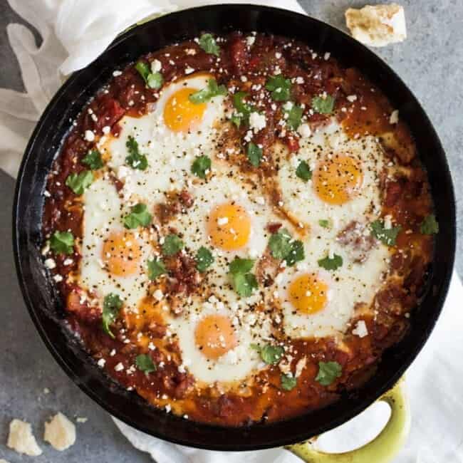 Easy Shakshuka Recipe in a large cast iron skillet.
