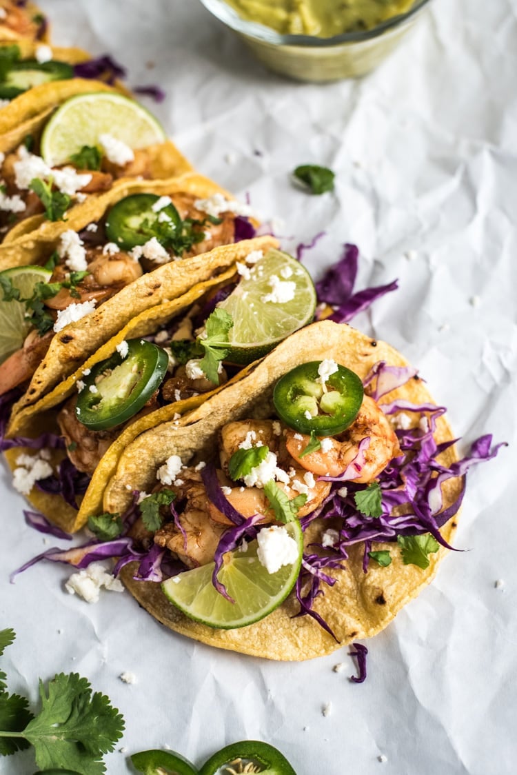 These Honey Balsamic Beer Shrimp Tacos are topped with a sweet and savory honey balsamic glaze that's made with a roasty stout beer. Ready in only 30 minutes!