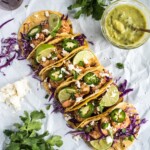 These Honey Balsamic Beer Shrimp Tacos are topped with a sweet and savory honey balsamic glaze that's made with a roasty stout beer. Ready in only 30 minutes!