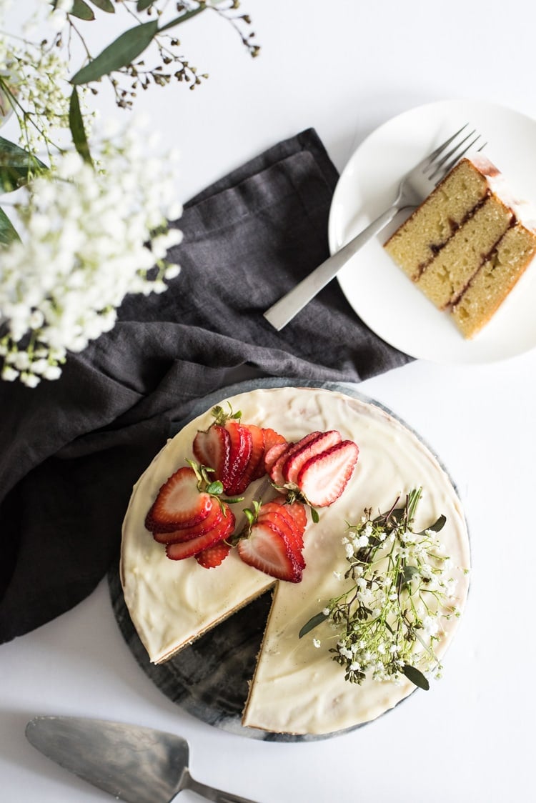 This Homemade Yellow Cake with Vanilla Cream Cheese Frosting is a rich and buttery layered "naked cake" perfect for any celebration!