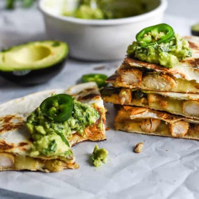 Seasoned with honey, garlic, lime juice and jalapeños, this Jalapeño Chicken Quesadilla topped with Honey Guacamole takes lunchtime to a whole new level.