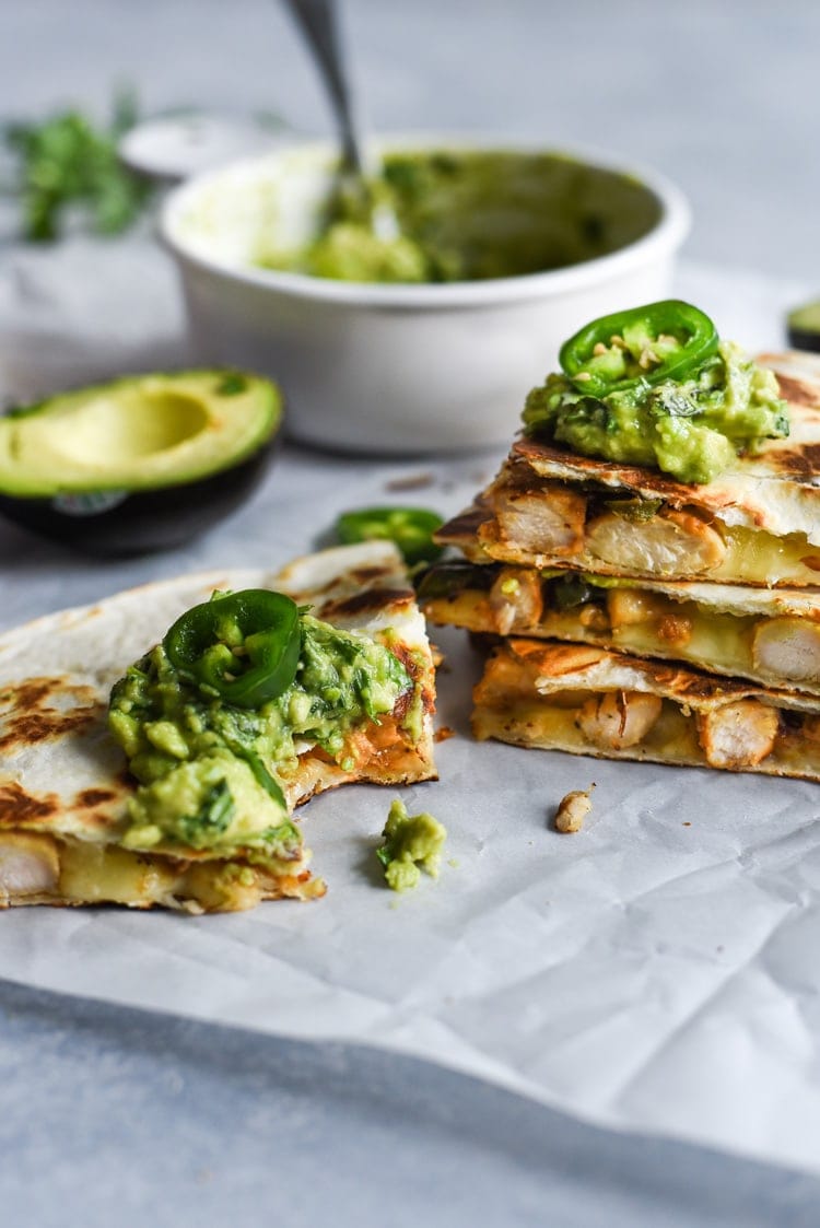 Seasoned with honey, garlic, lime juice and jalapeños, this Jalapeño Chicken Quesadilla topped with Honey Guacamole takes lunchtime to a whole new level.