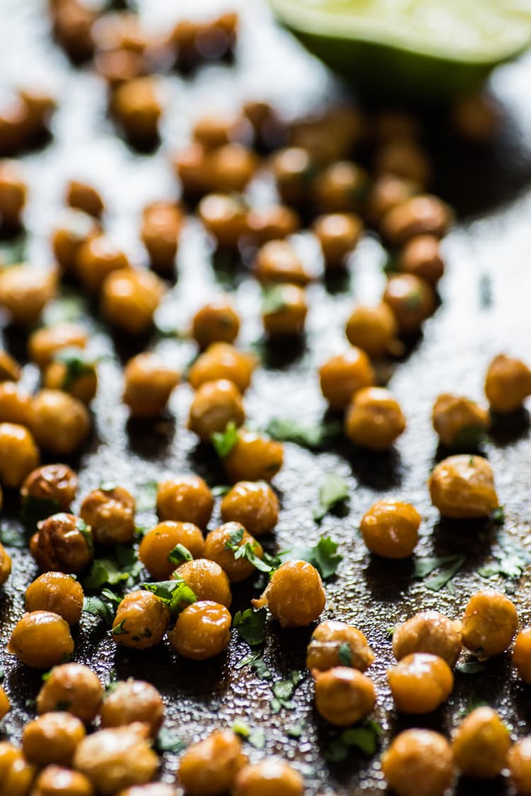 These Cilantro Lime Roasted Chickpeas are a healthy and addicting salty snack with plenty of crunch to satisfy your snack cravings! (gluten free, vegetarian, vegan)