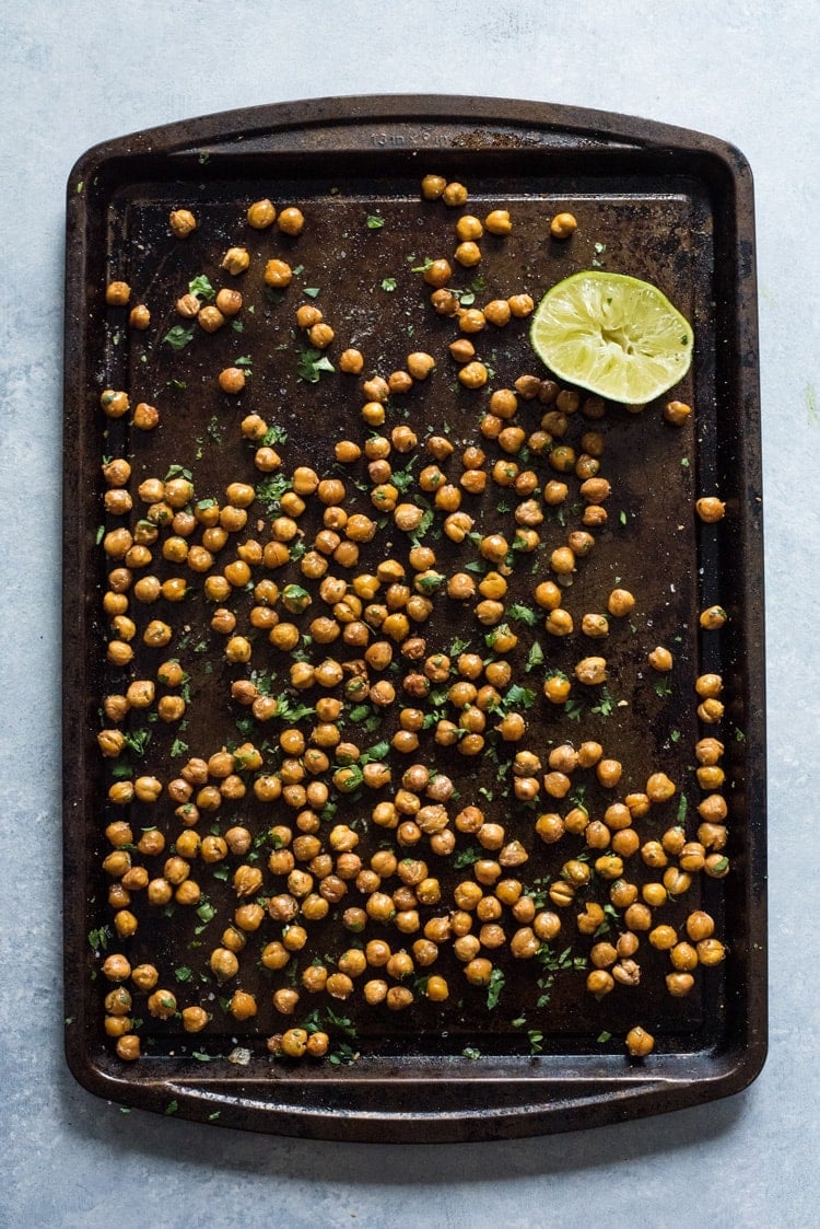 These Cilantro Lime Roasted Chickpeas are a healthy and addicting salty snack with plenty of crunch to satisfy your snack cravings! (gluten free, vegetarian, vegan)