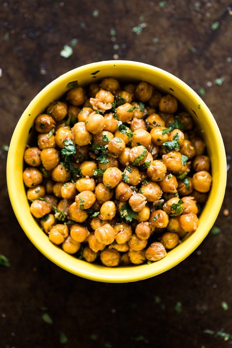 These Cilantro Lime Roasted Chickpeas are a healthy and addicting salty snack with plenty of crunch to satisfy your snack cravings! (gluten free, vegetarian, vegan)