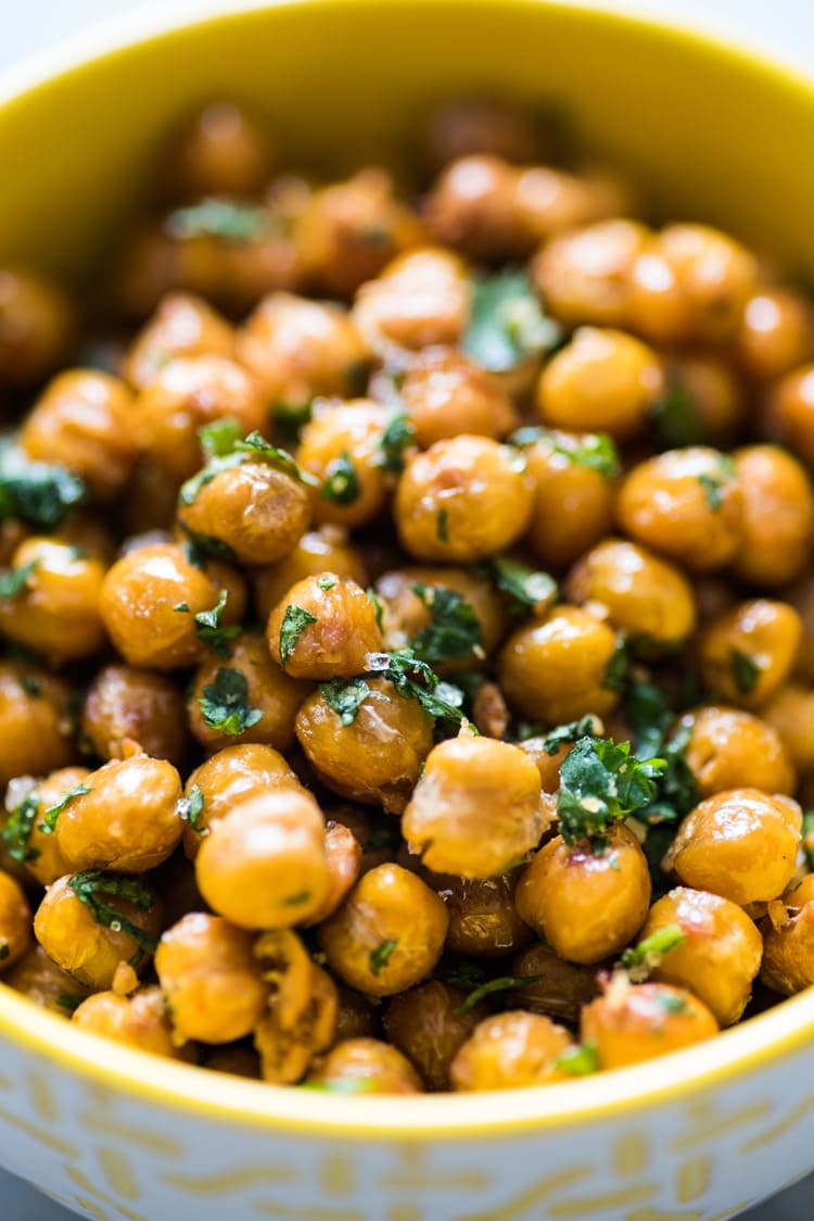 These Cilantro Lime Roasted Chickpeas are a healthy and addicting salty snack with plenty of crunch to satisfy your snack cravings! (gluten free, vegetarian, vegan)