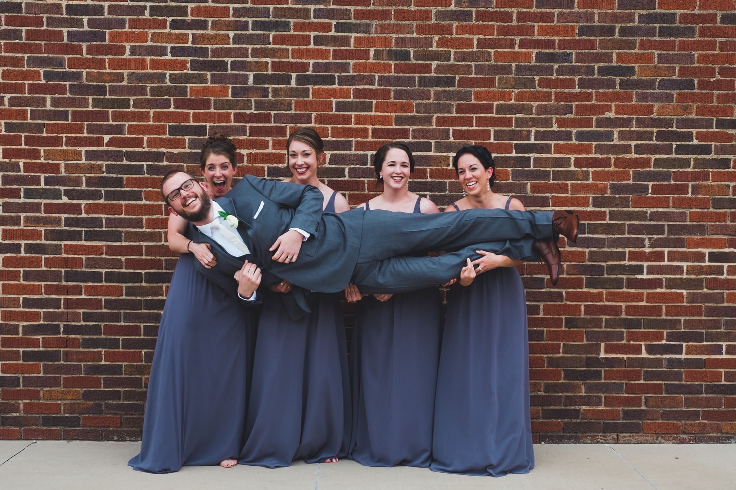 Isabel Orozco Moore and John Moore wedding party in Film Row in Oklahoma City // Photo by Leia Smethurst