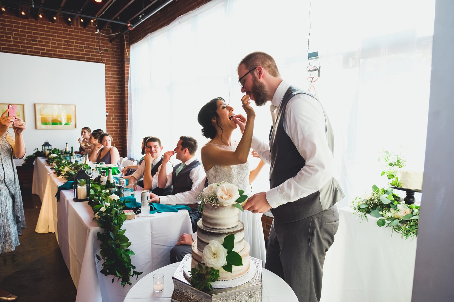 Stacie's Cake naked wedding cake at John Moore and Isabel Orozco Moore wedding at IAO Gallery in Oklahoma City // Photo by Leia Smethurst Photography