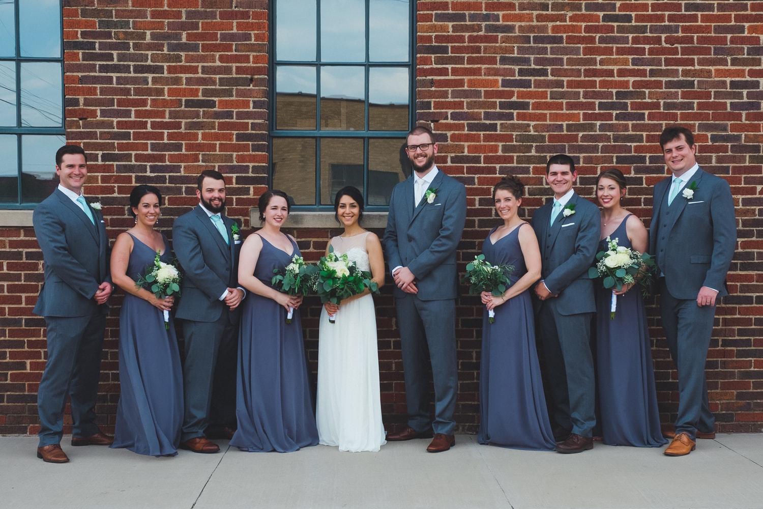 Isabel Orozco Moore and John Moore wedding party in Film Row in Oklahoma City // Photo by Leia Smethurst